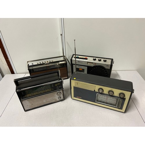 59 - 4 x vintage radios to include Bush, Vega, JVC and ITT Monaco.