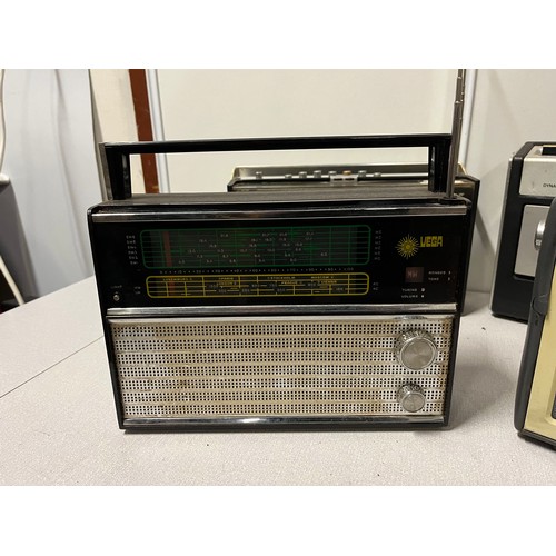 59 - 4 x vintage radios to include Bush, Vega, JVC and ITT Monaco.