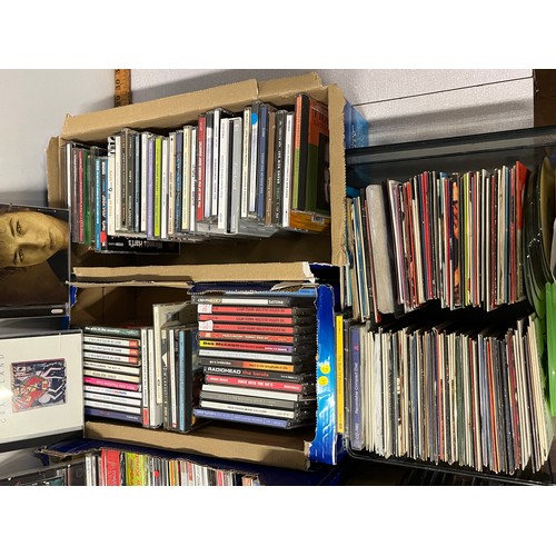 117 - collection of mixed genre cds from owner of local radio station 
to include , bob dylan , paul simon... 