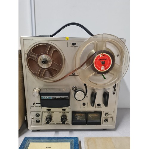 120 - AKAI 1722L reel to reel stereo tape recorder along with selection of reels. Untested.