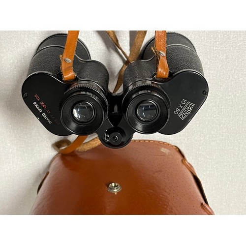 239 - Pair of Prinz binoculars with leather case.