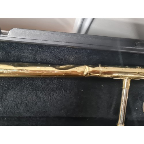 47 - Bach trombone in case. See pics for condition.