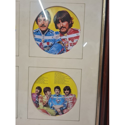 58 - 2 x The Beatles Sgt Peppers framed wall hangings.
40cm x 50cm