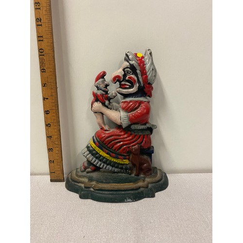 13 - Vintage cast iron Punch and Judy door stop.
26cm h