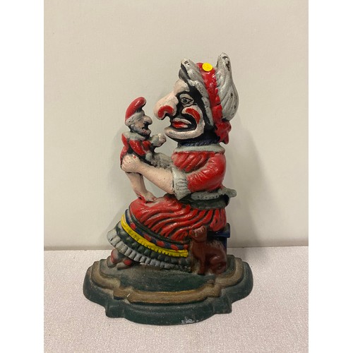 13 - Vintage cast iron Punch and Judy door stop.
26cm h