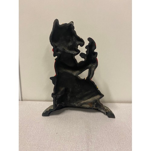 13 - Vintage cast iron Punch and Judy door stop.
26cm h