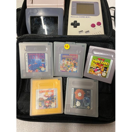 28 - Original Nintendo Game Boy with 5 games, magnify screen and carrycase. Working but No power cable