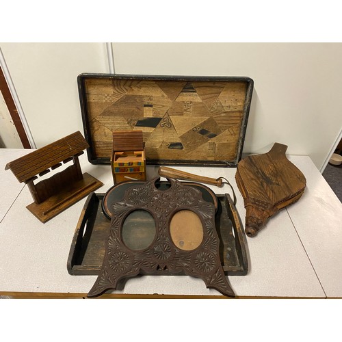 176 - Selection of treen items to include pipe stand, priest and trays etc.