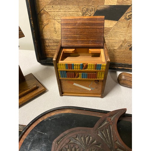 176 - Selection of treen items to include pipe stand, priest and trays etc.