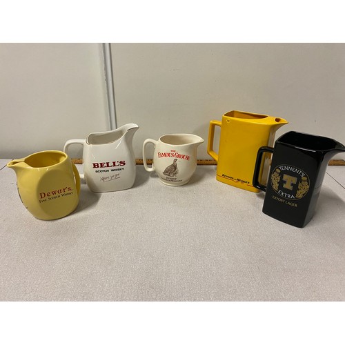 5 x vintage Pub water jugs.