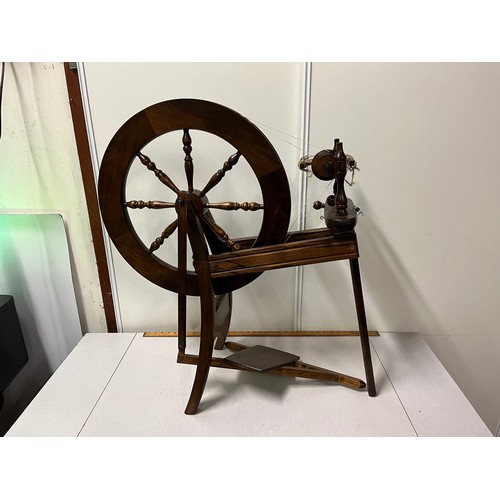 36 - Ashford mahogany spinning wheel.
84cm x 76cm