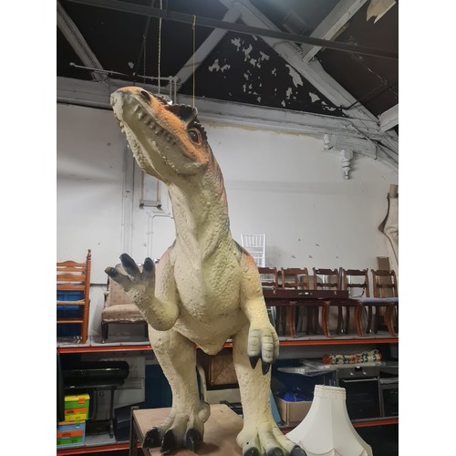 64 - Dinosaur model made from poly-resin and fibreglass orange and black stripe. Size approx. 208cm x 106... 