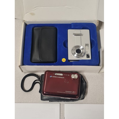 629 - New boxed digital camera with soft ware and manual along with one other.