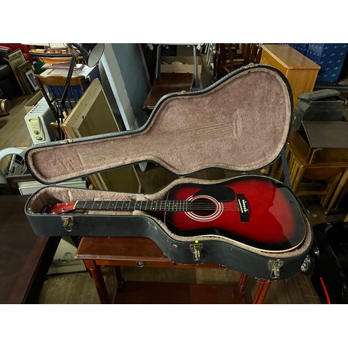 46 - Falcon acoustic guitar and hard case.