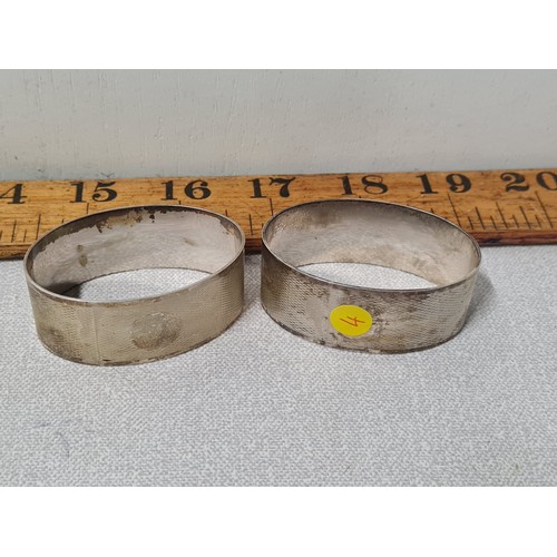 228 - Pair of hallmarked silver napkin rings.