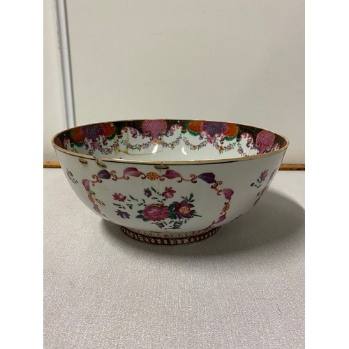 311 - 2 Antique bowls - one with floral pattern and one with dragon pattern. Both bowls have staple repair... 