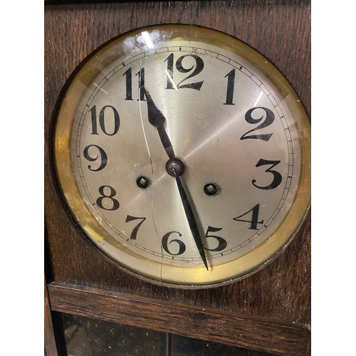 344 - Art Deco wall clock with key and pendulum (slight damage to glass)