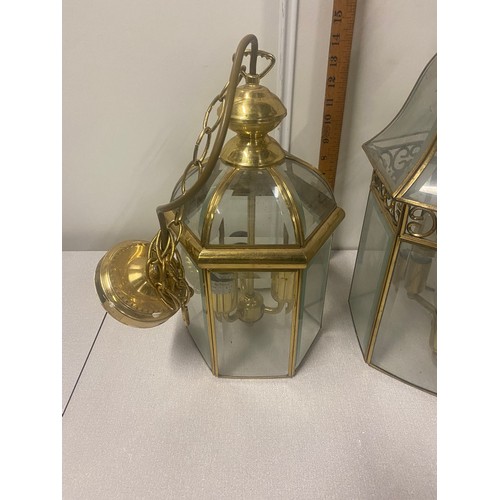 92 - 2 x vintage glass and brass ceiling lights.
Tallest 54cm