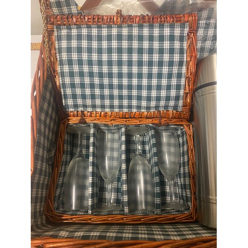 93 - Large wicker picnic hamper with contents to include - 4 x champagne flutes and flask etc.