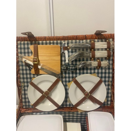 93 - Large wicker picnic hamper with contents to include - 4 x champagne flutes and flask etc.