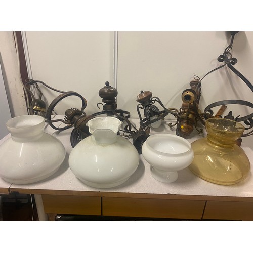 206 - Collection of antique ceiling lights and glass shades.