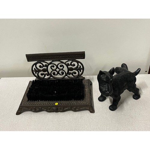 165 - Cast iron Scottie dog door stop and Victorian design boot scraper.