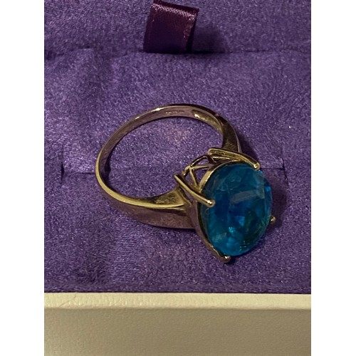 81 - 9ct gold cocktail ring with extremely large blue topaz.