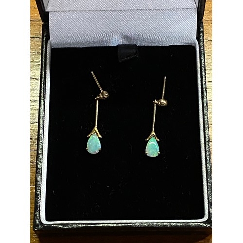 82 - 9ct gold and opal drop earrings. (no backs)