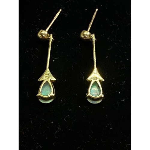 82 - 9ct gold and opal drop earrings. (no backs)