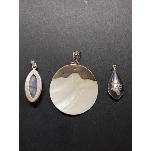 86 - 3 vintage silver pendants - moonstone, mother of pearl and Siamese silver.