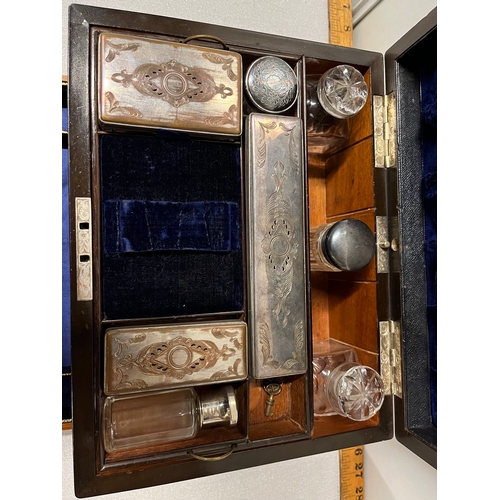 9 - Antique burr walnut vanity case with mother of pearl inlay & contents with 1 silver topped jar. Key ... 