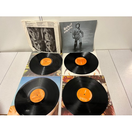 6 - 4 david bowie vinyl albums 
good condition