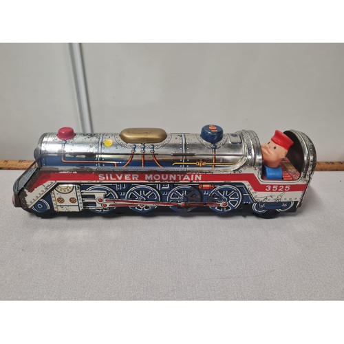 31 - vintage tinplate silver mountain train & driver
40cm l