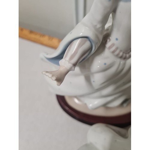 38 - 2 lladro figurines 
as found