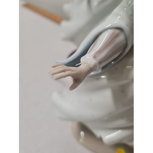 38 - 2 lladro figurines 
as found