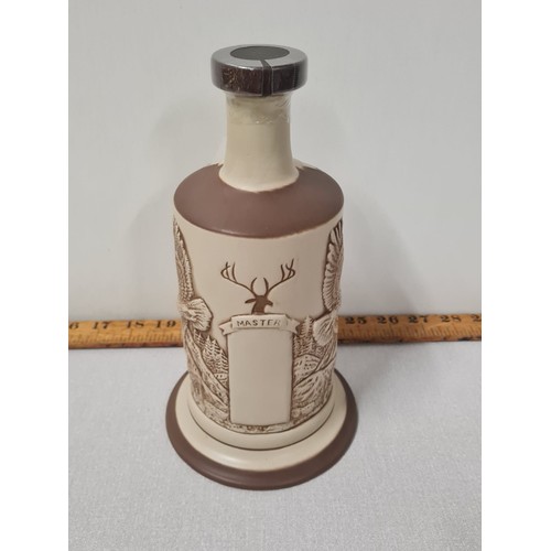 233 - R. Carmichael and Sons Supreme Master Scotch whisky aged 21 years in ceramic decanter. Full and seal... 