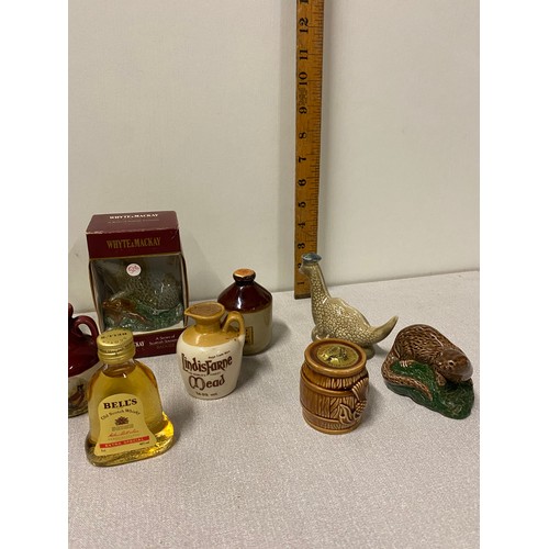 184 - Collection of miniature whisky's to include Nessie decanter and Bells etc. All full and sealed.