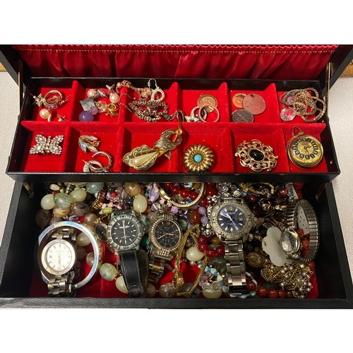 129 - Jewellery box filled with mixed costume jewellery and watches.