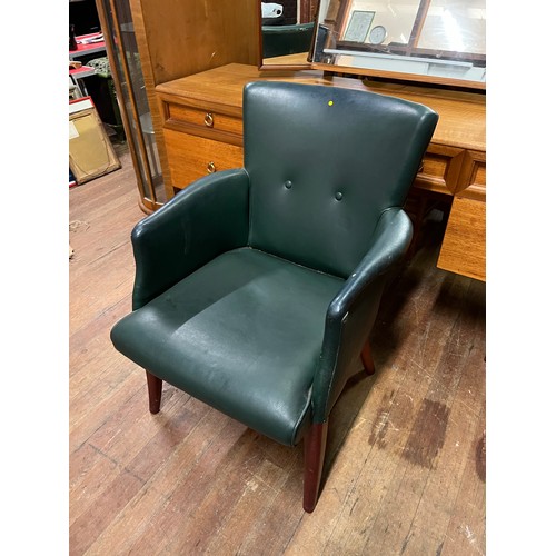 608 - Vintage green leather armchair, slight damage, see pictures.