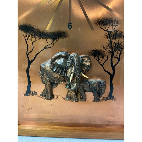 106 - Vintage copper wall clock depicting Elephant scene.
44cm x 64cm