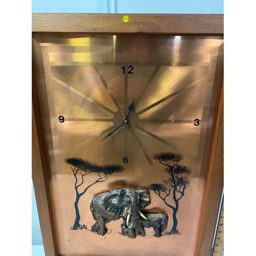 106 - Vintage copper wall clock depicting Elephant scene.
44cm x 64cm