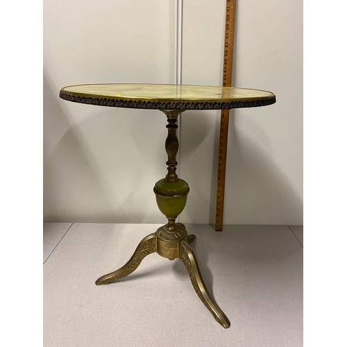 111 - Vintage onyx and brass pedestal table.
57cm h 
50cm diameter