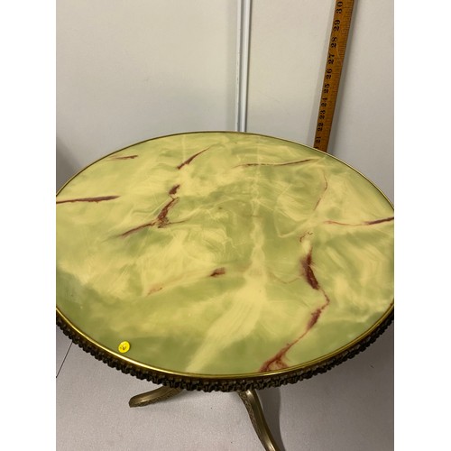 111 - Vintage onyx and brass pedestal table.
57cm h 
50cm diameter