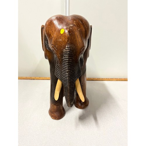 82 - Large carved wooden elephant.
28cm x 30cm