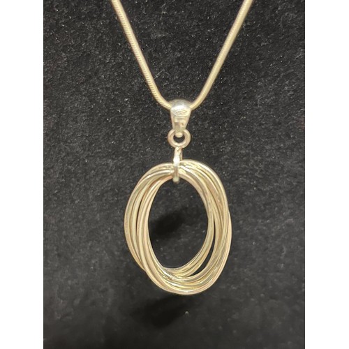 91 - Silver chain with silver multi hoop pendant.