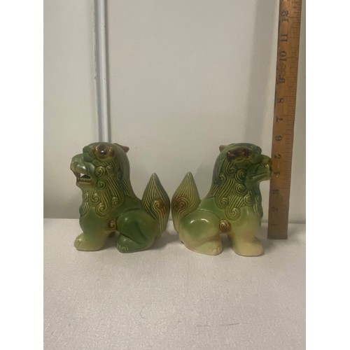 142 - Pair of Chinese republic ceramic Foo dogs.
14cm x 12cm