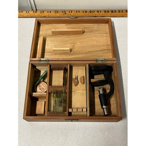 551 - Vintage microscope  in fitted case with glass slides.