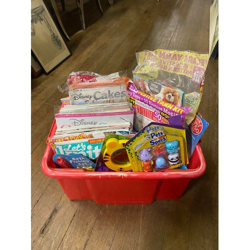 563 - Box of craft and baking magazines along with new kids toys.