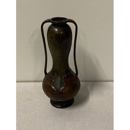 19 - Antique bronze Art Nouveau 2 handled vase. Decorated with leaf design. 
25.5cm tall.