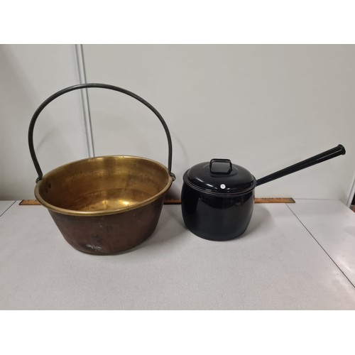 116 - Antique brass jelly pan and cast iron lidded pot.